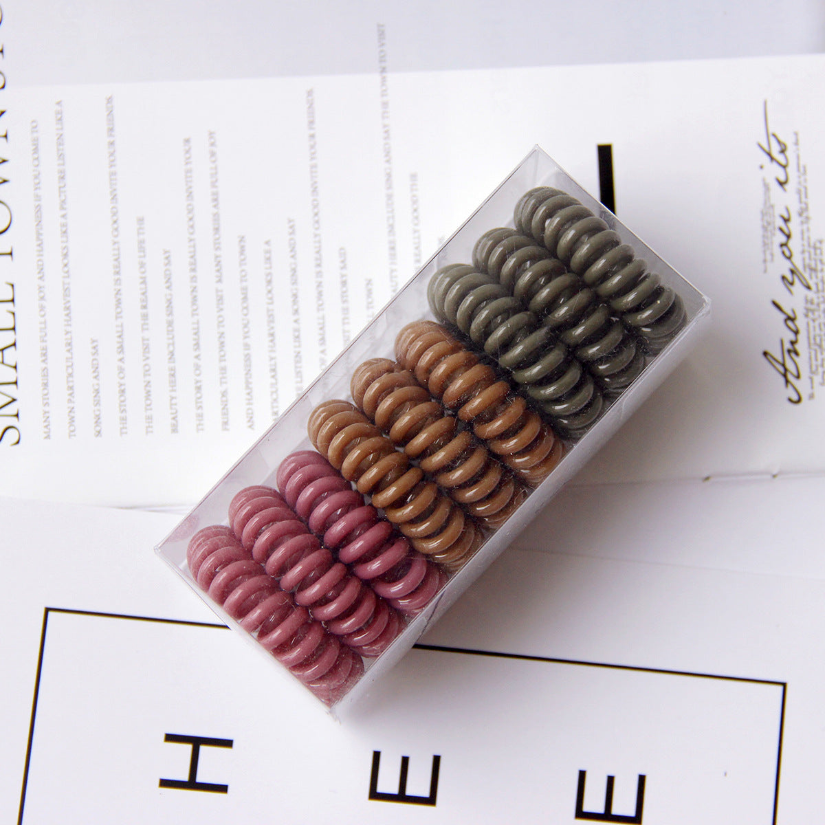 Vintage TPU hair rings no crease ponytail holders multi color
Strong hold hair ties for buns and ponytails flexible design
Geometric hair rings worn as wrist accessory and hair tie
Durable TPU hair bands for thick hair everyday styling