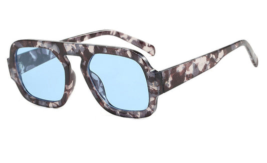 Sunglasses with a camouflage frame and blue lenses on a white background