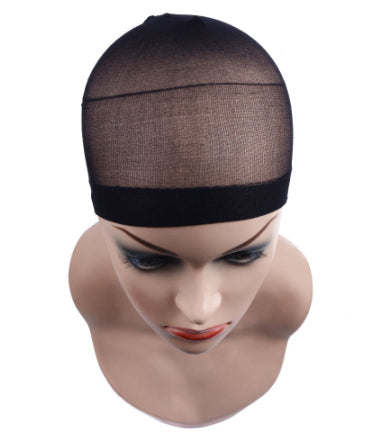Get a smooth, secure base for every wig style. This 2-pack of premium wig hair nets keeps your natural hair flat, controlled, and perfectly in place—so your wigs and weaves look more natural and stay secure all day. The breathable stretch mesh adapts comfortably to your head without pulling or irritation, while holding edges and stray hairs neatly in place. Lightweight yet durable, these nets create a seamless foundation that improves fit, comfort, and overall finish. Perfect for daily wear, quick styling,