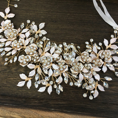 Elegant bridal headband silver crystal wedding hair accessory
Gold wedding headband for bride formal hairstyle accessory
Woman wearing bridal hairband for wedding hairstyle
Alloy headband for special occasions and bridal look
