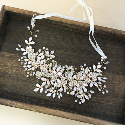 Elegant bridal headband silver crystal wedding hair accessory
Gold wedding headband for bride formal hairstyle accessory
Woman wearing bridal hairband for wedding hairstyle
Alloy headband for special occasions and bridal look