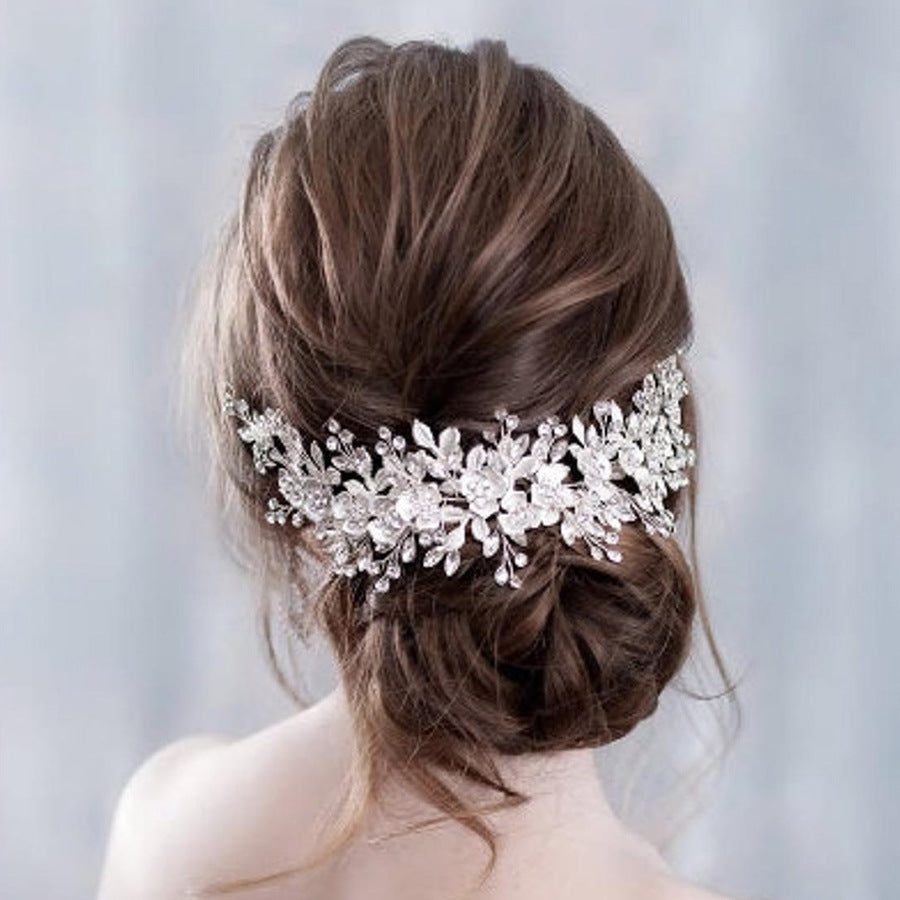 Elegant bridal headband silver crystal wedding hair accessory
Gold wedding headband for bride formal hairstyle accessory
Woman wearing bridal hairband for wedding hairstyle
Alloy headband for special occasions and bridal look