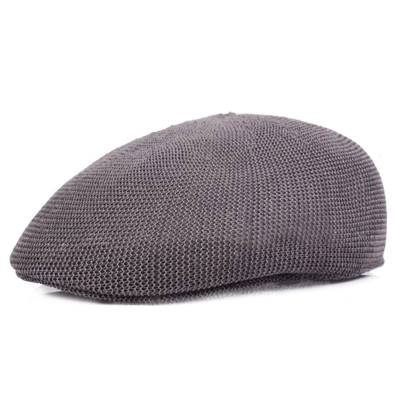 Hand-hooked Korean short brim peaked cap in beige on white background