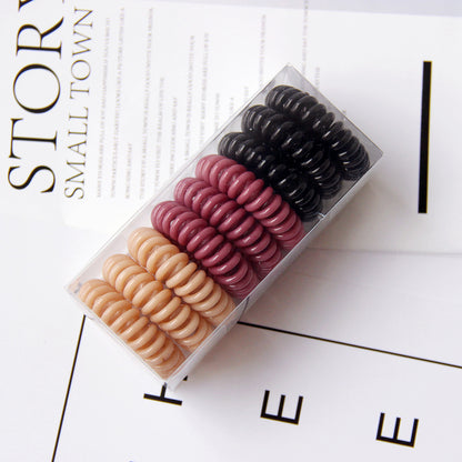 Vintage TPU hair rings no crease ponytail holders multi color
Strong hold hair ties for buns and ponytails flexible design
Geometric hair rings worn as wrist accessory and hair tie
Durable TPU hair bands for thick hair everyday styling