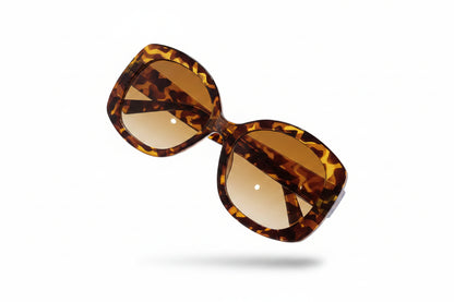 retro fashion sunglasses unisex UV protection eyewear
stylish casual sunglasses leopard print and black frames
lightweight travel sunglasses tinted lenses fashion style