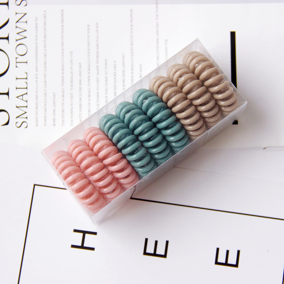 Vintage TPU hair rings no crease ponytail holders multi color
Strong hold hair ties for buns and ponytails flexible design
Geometric hair rings worn as wrist accessory and hair tie
Durable TPU hair bands for thick hair everyday styling