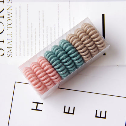 Vintage TPU hair rings no crease ponytail holders multi color
Strong hold hair ties for buns and ponytails flexible design
Geometric hair rings worn as wrist accessory and hair tie
Durable TPU hair bands for thick hair everyday styling