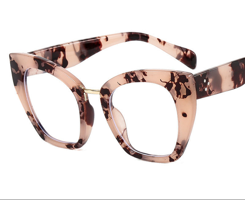 Cat-eye glasses with a tortoiseshell pattern , labeled 'Pink Yellow+AB Lenses'.