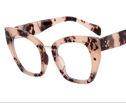 Cat-eye glasses with a tortoiseshell pattern , labeled 'Pink Yellow+AB Lenses'.