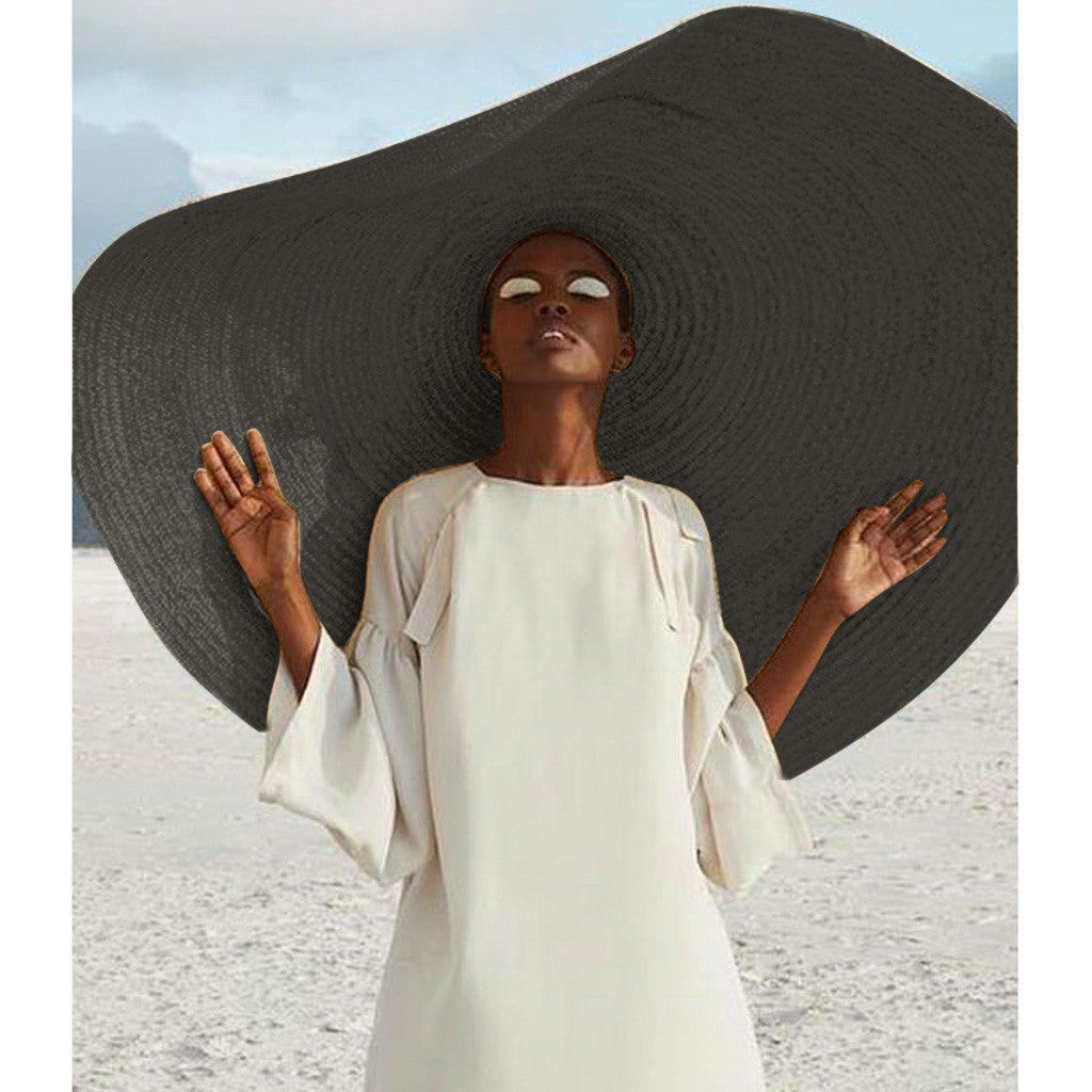   Four color options of women's dome-crown straw hat — khaki, black, white, and gray — laid flat