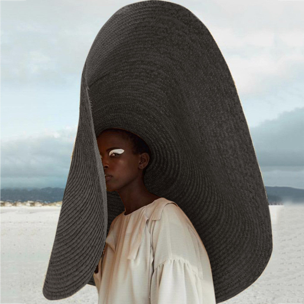 Women's wide-brim khaki straw sun hat with flat eaves and dome crown for summer UV protection