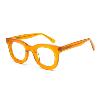 Eyeglasses with orange and black frame on a white background