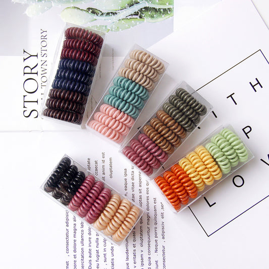Vintage TPU hair rings no crease ponytail holders multi color
Strong hold hair ties for buns and ponytails flexible design
Geometric hair rings worn as wrist accessory and hair tie
Durable TPU hair bands for thick hair everyday styling
