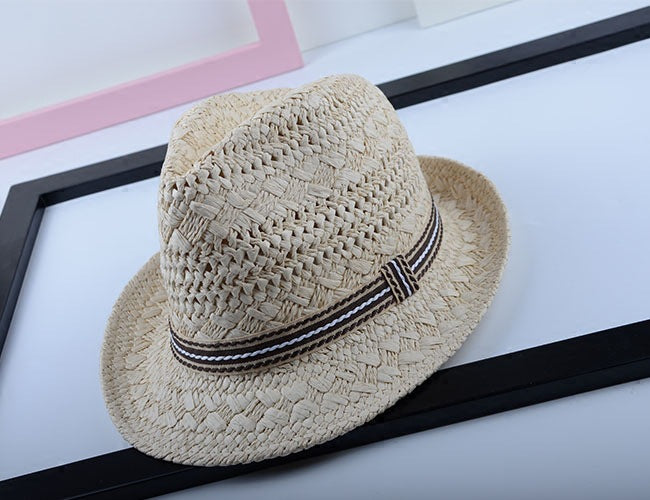 Close-up of papyrus straw weave texture on wide brim sun hat