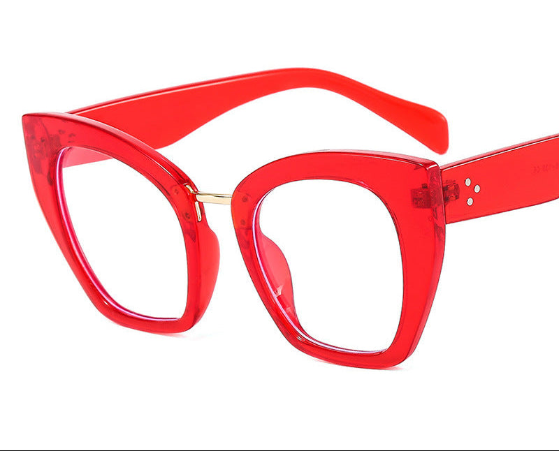 Red eyeglasses with 'RED+AB LENSES' \