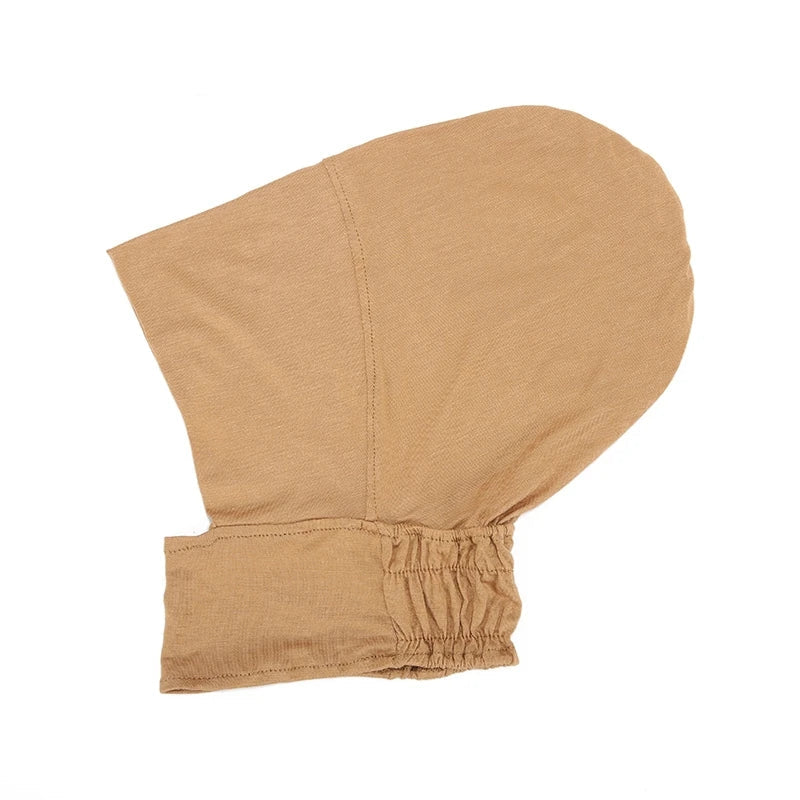 Stretchy jersey hijab cap worn under headscarf
Soft cotton underscarf for secure hijab styling
