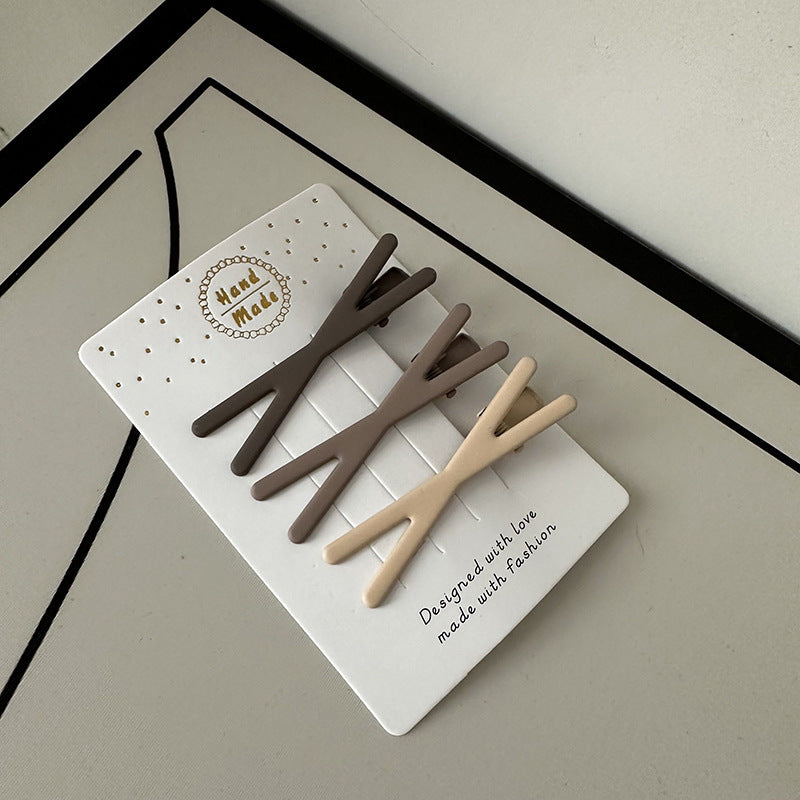 Coffee color alloy hair clips set with irregular modern designs