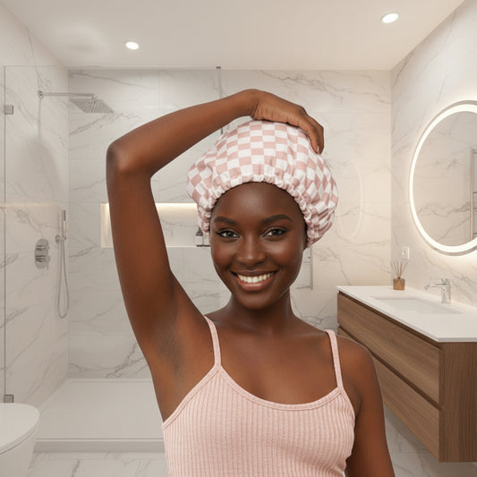 Woman wearing a checkered shower cap in a modern bathroom