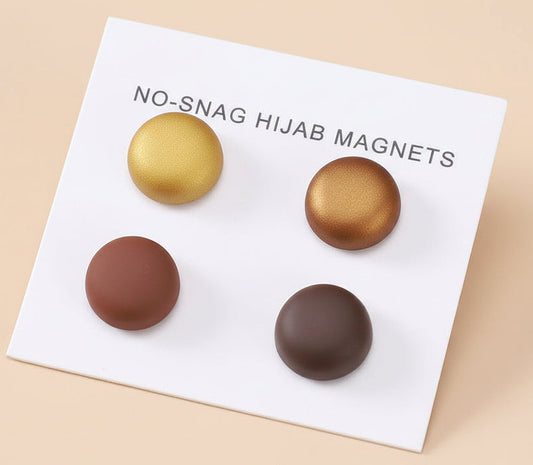 Set of four gold hijab magnets on a white card with 'No-Snag Hijab Magnets'