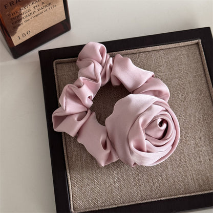 French-style satin scrunchie with rose-inspired design for women
Vintage large hair ring for ponytails, buns, and wrist wear
Soft luxurious satin scrunchie preventing hair breakage
Voluminous French scrunchie adding elegance to casual and formal looks