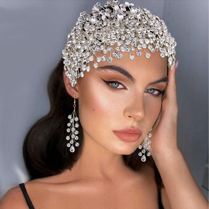 Rhinestone bridal headband with floral handmade design
Elegant silver wedding headpiece with sparkling crystals
Handmade rhinestone hair accessory for brides
Luxury bridal headband with matching earrings option