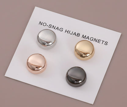 Set of four hijab magnets on a white card with 'No-Snag Hijab Magnets Magnetic hijab pins no snag colorful macaron clasp set
Strong magnetic scarf clips holding hijab without holes
Round colorful hijab magnets for secure fabric hold
Lightweight no snag hijab clasps for everyday wear